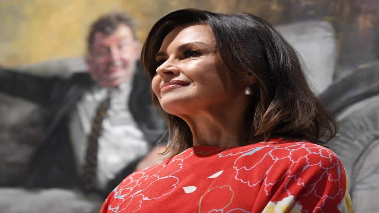 Journalist and television personality Lisa Wilkinson looks on