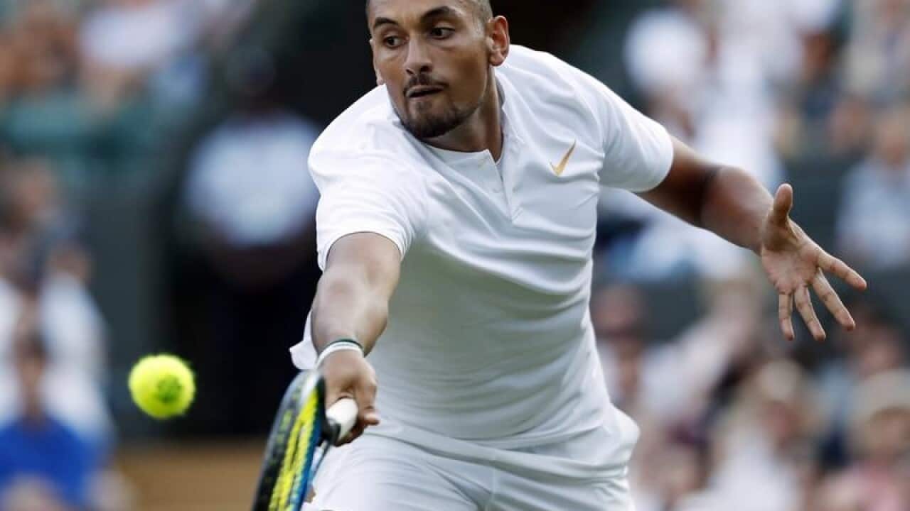 Nick Kyrgios of Australia returns to Kei Nishikori of Japan.