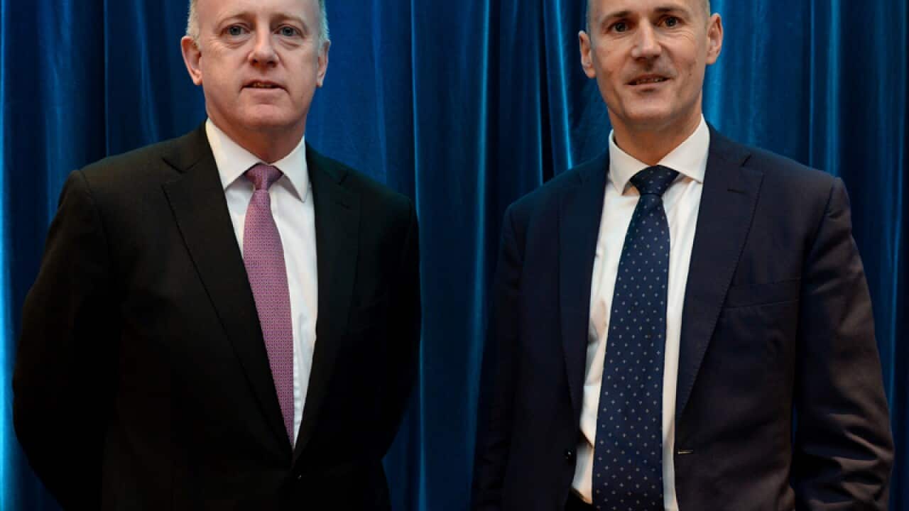 QBE CEO John Neal (L) and CFO Patrick Regan