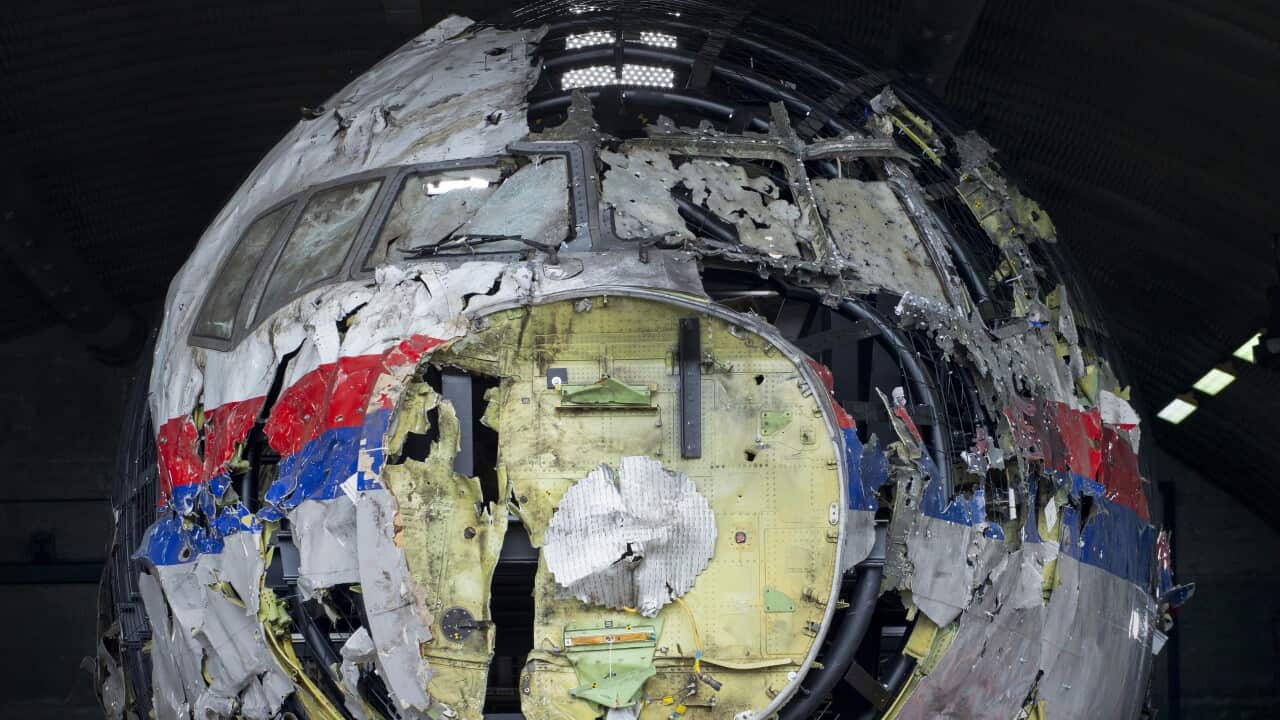 File photo the reconstructed wreckage of Malaysia Airlines Flight MH17, is shown at the Gilze-Rijen Airbase, southern Netherlands.