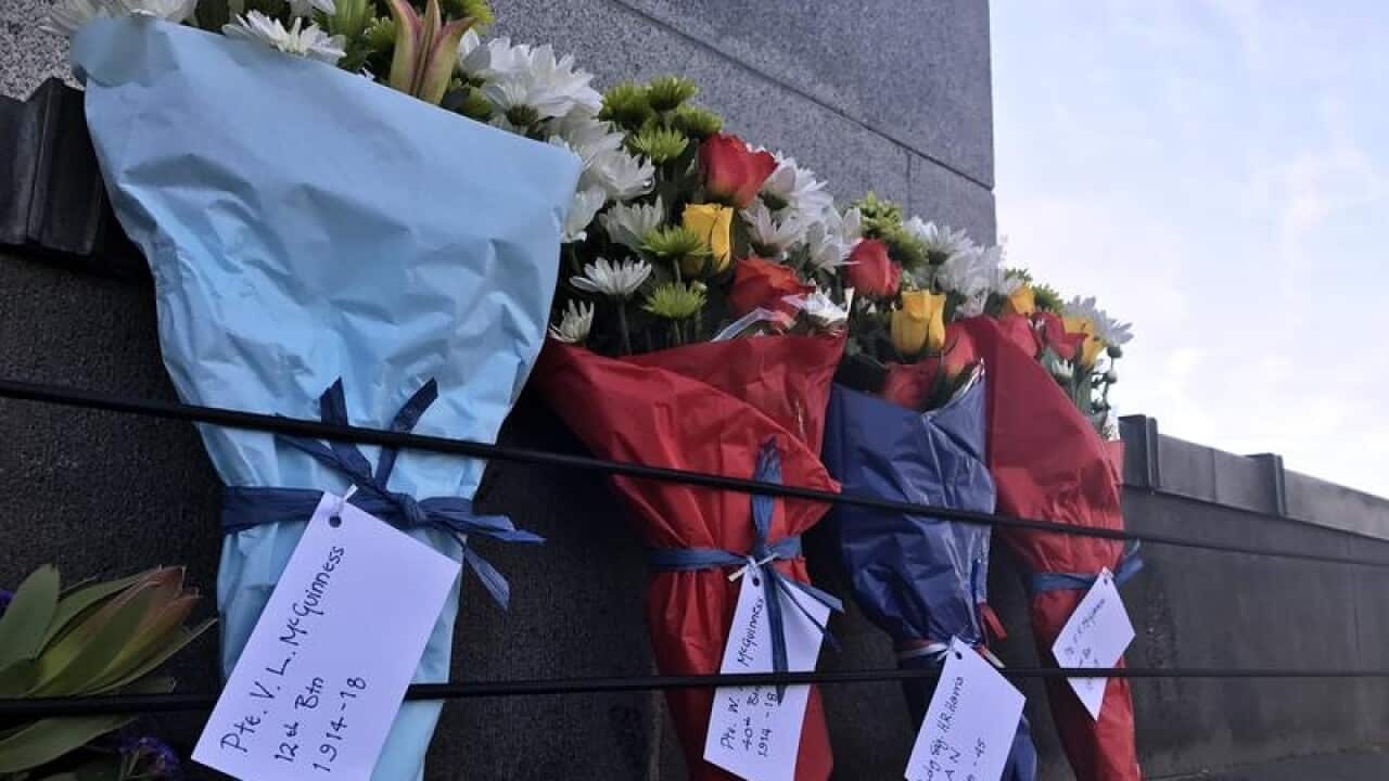 Flowers at the Hobart Cenotaph during the Anzac Day dawn service.