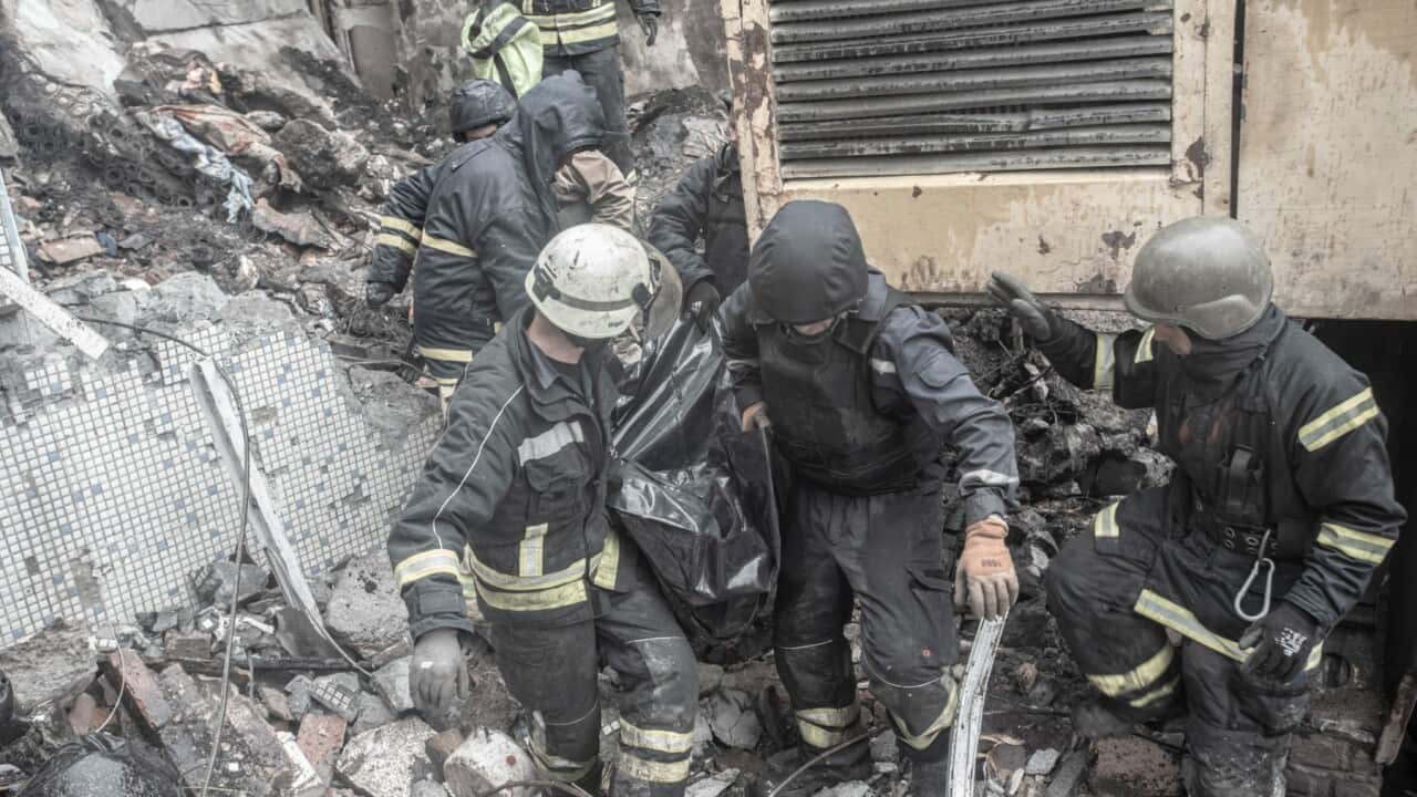Firemen rescuing the dead bodies of a woman and his son of 1 year old in a destroyed house by a rocket launched from a russian airplane in Bakhmur, Donbas, Ukraine. Wednesday 18th of May of 2022.