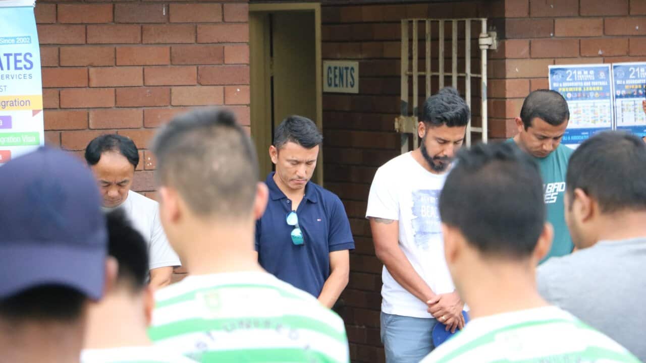 Members of Sydney's Nepali community mourning the death of their friend by drowning