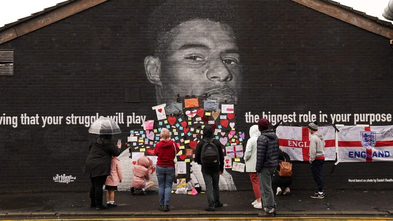 Messages of support cover offensive wording on the mural of Manchester United striker and England player Marcus Rashford