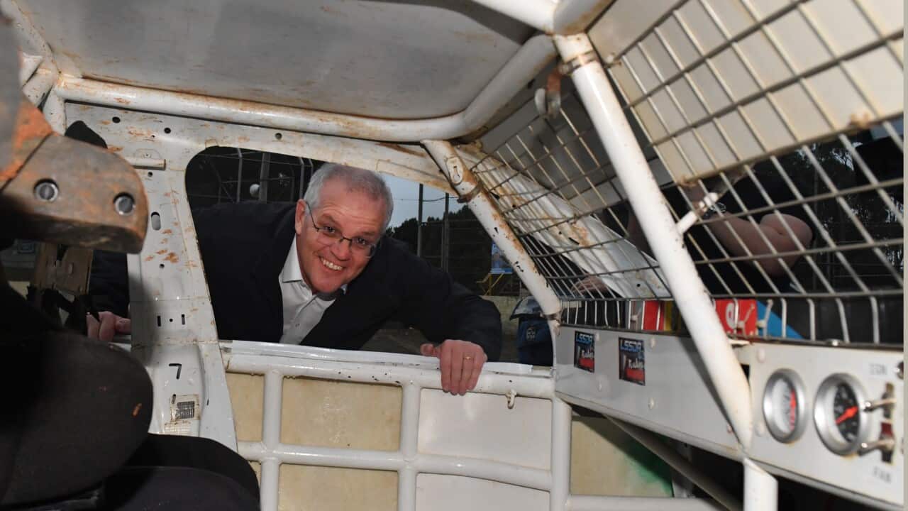 Scott Morrison looking through car window
