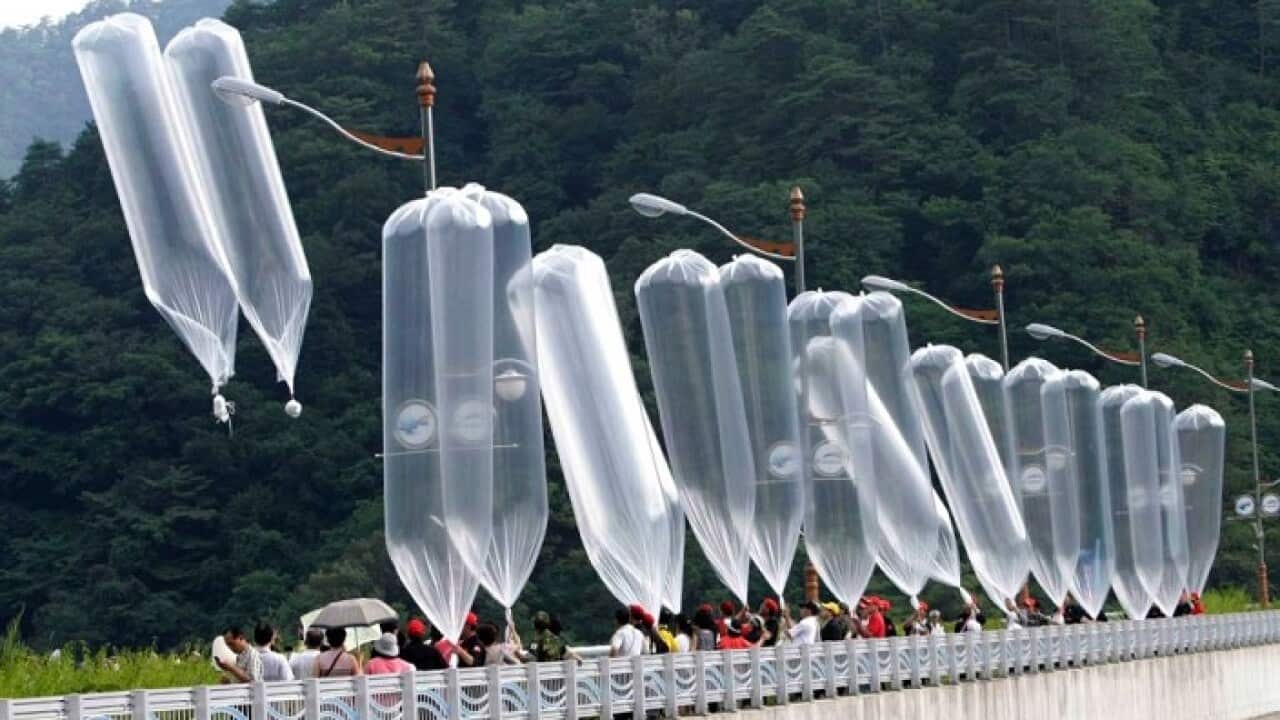 South Korean conservative activists launch balloons