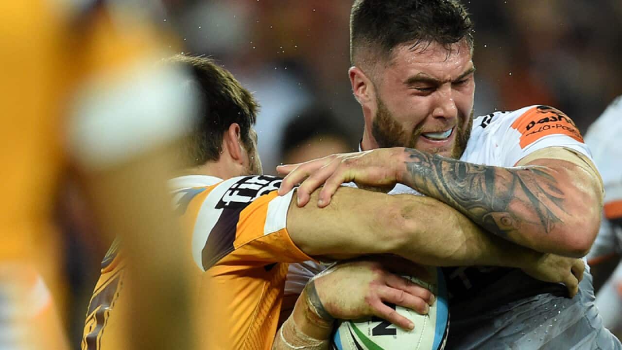Tigers NRL star Curtis Sironen (R)