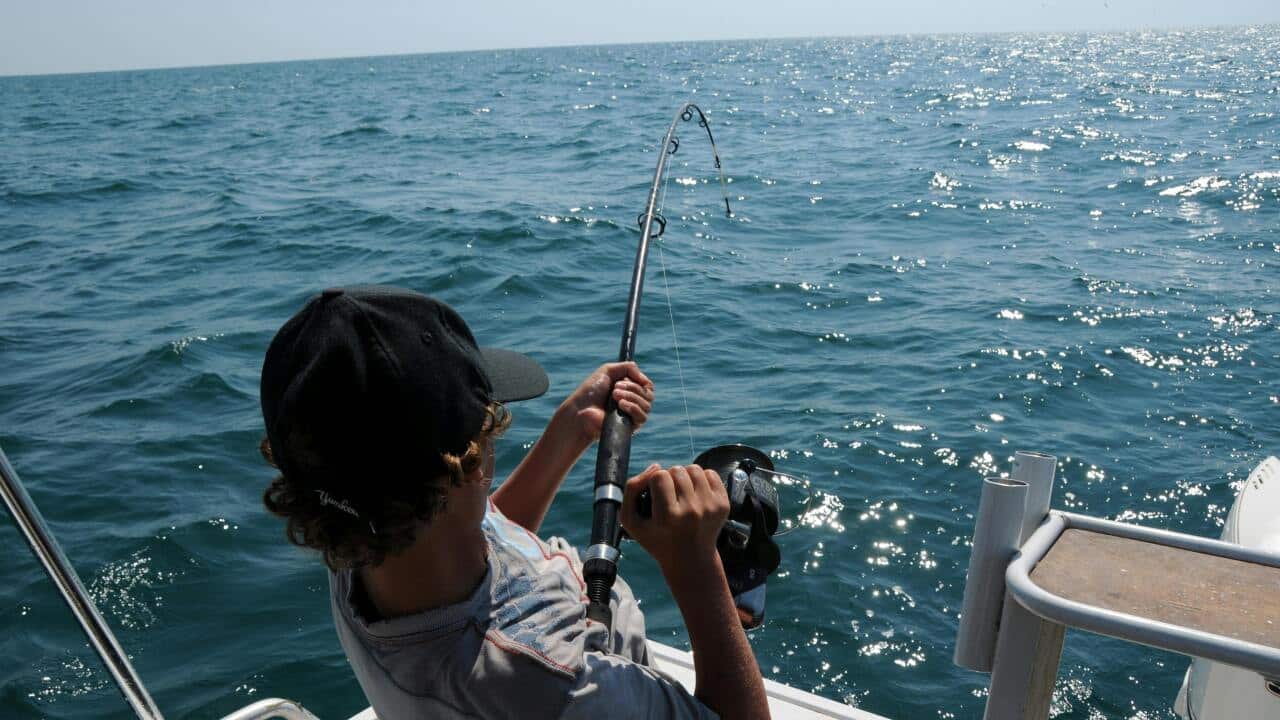 A representative image of a man fishing in Broome, Western Australia.