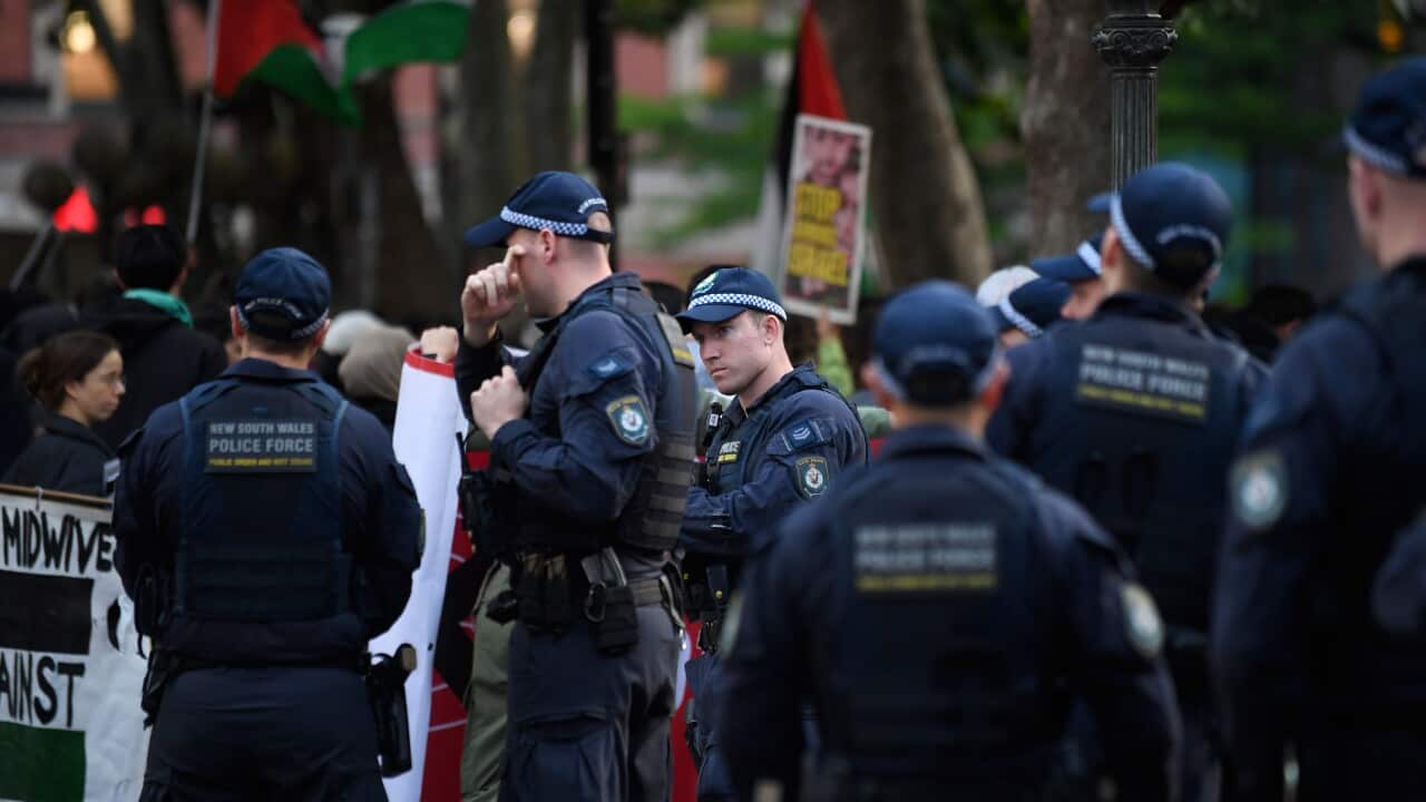 A group of police officers at a protest.