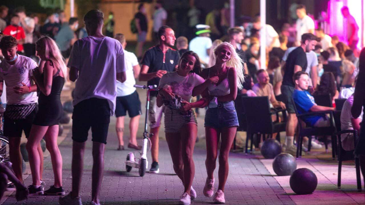 Young tourists at the beach resort of Magaluf on the Spanish Balearic island of Mallorca, Spain.