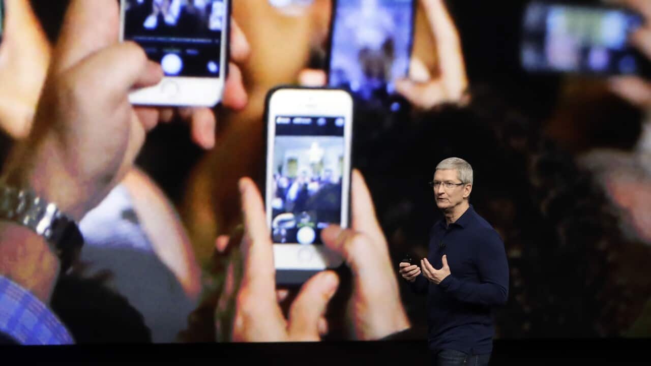 Apple CEO Tim Cook announces the new iPhone 7 during an event to announce new products Wednesday, Sept. 7, 2016, in San Francisco. (AP Photo/Marcio Jose Sanchez)