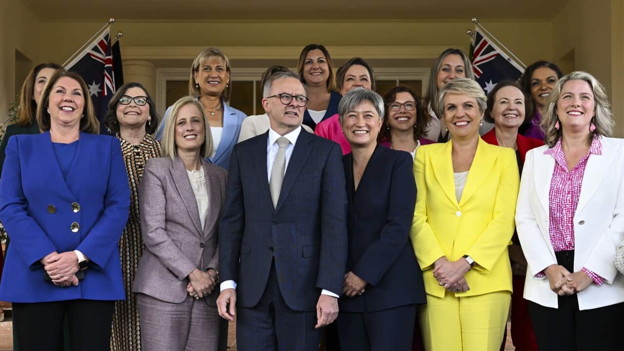 Prime Minister Anthony Albanese standing with female ministers at Parliament House.