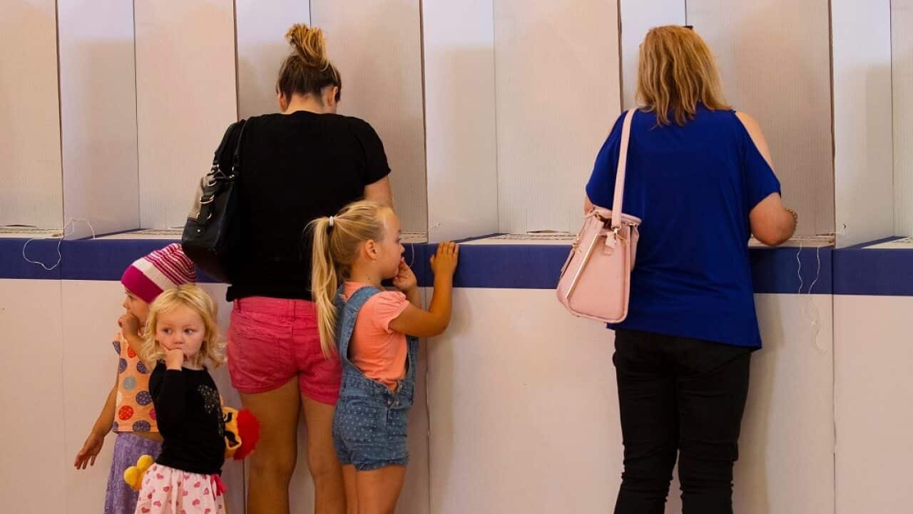 Voters cast their ballots in the Tasmanian State Election at Sorell Memorial Hall, Saturday, March 3, 2018. (AAP Image/Rob Blakers) NO ARCHIVING
