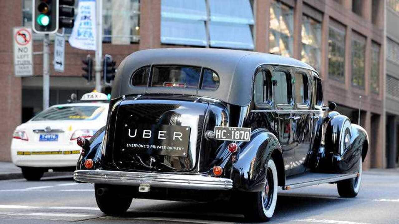 Uber signage seen on a vintage car in Sydney