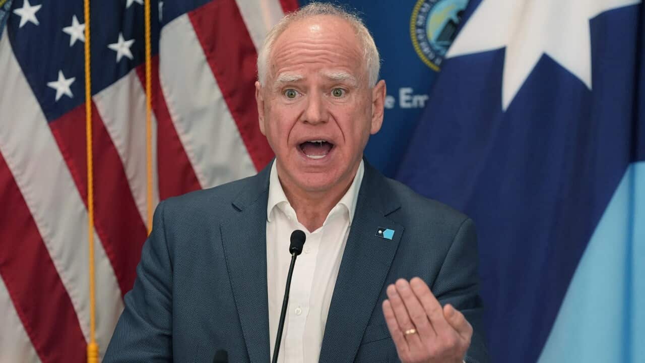 Minnesota Gov. Tim Walz speaks during a news conference (AAP)