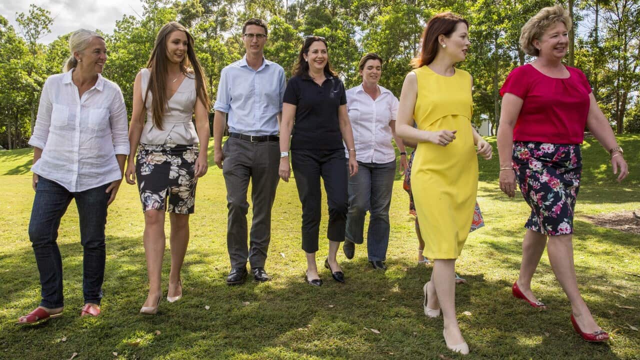 Premier Annastacia Palaszczuk with winning Labor candidates from the Queensland election.