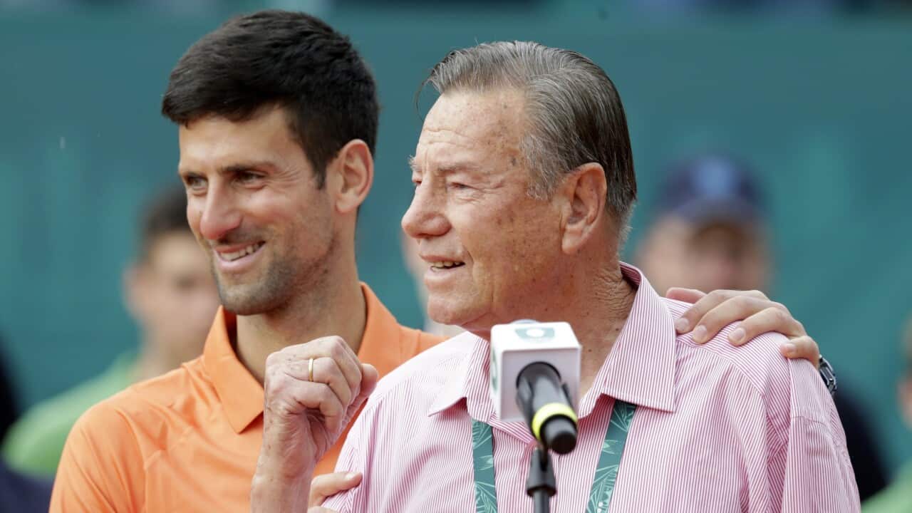 epa09906979 Novak Djokovic of Serbia (R) hugs his former coach Nikola “Niki” Pilic during the trophy presentation after the final match of the Serbia Open tennis tournament in Belgrade, Serbia, 24 April 2022. EPA/ANDREJ CUKIC