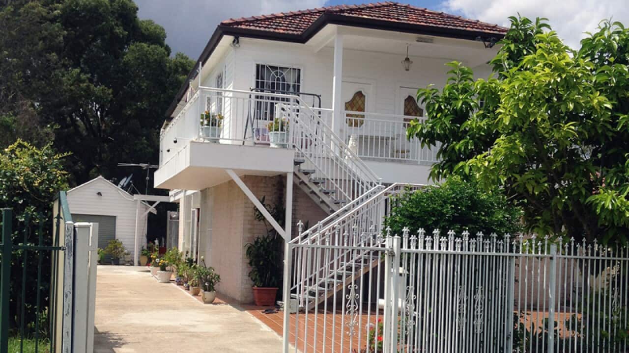 Scenes from a police raid on a granny flat