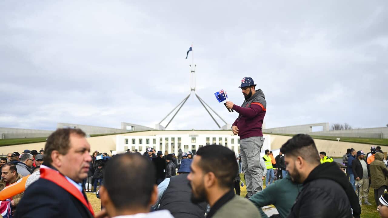 A visa protection protest held at Parliament House (AAP).jpg
