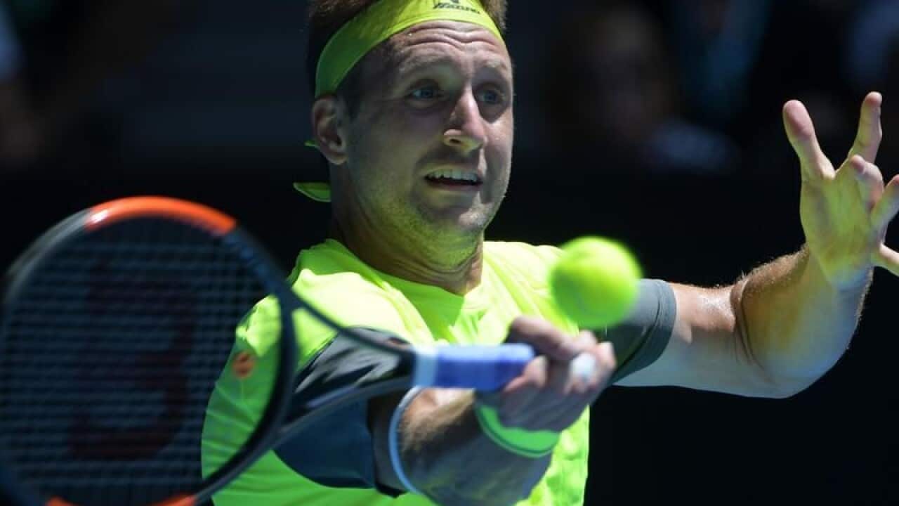 Tennys Sandgren of USA in action against Hyeon Chung.