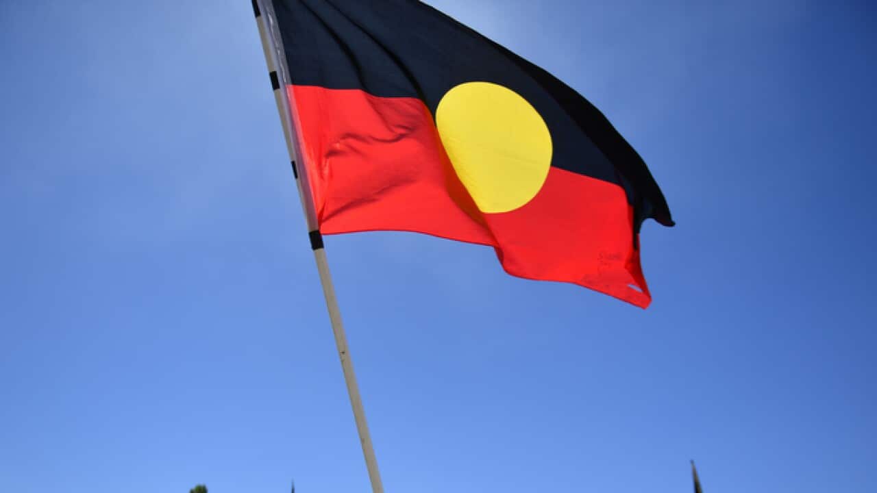 Protestors at an Invasion Day rally at the Aboriginal Tent Embassy, outside Old Parliament House in Canberra, Thursday, Jan. 26, 2017. (AAP Image/Mick Tsikas) NO ARCHIVING