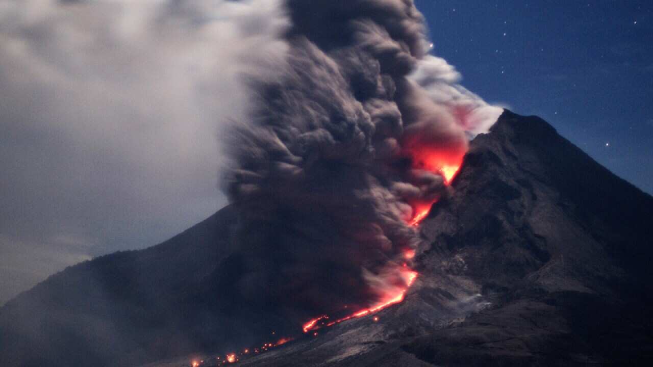 Mount Sinabung spews hot ash and lava