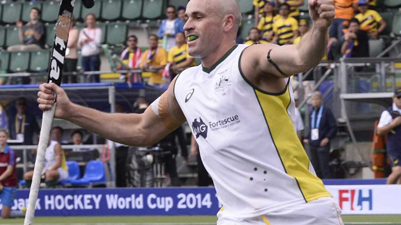 Australia's hockey players celebrate a goal