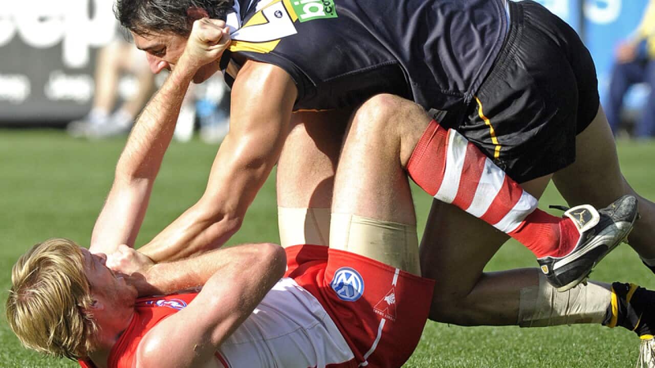 Lewis Roberts-Thompson is tackled.