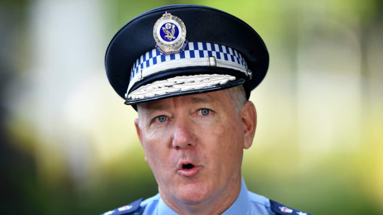 NSW Police Commissioner Mick Fuller speaks to the media during a press conference outside the RFS Headquarters in Sydney, Thursday, April 2, 2020