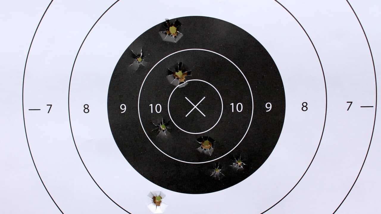 Close-Up Of Target With Bullet Holes