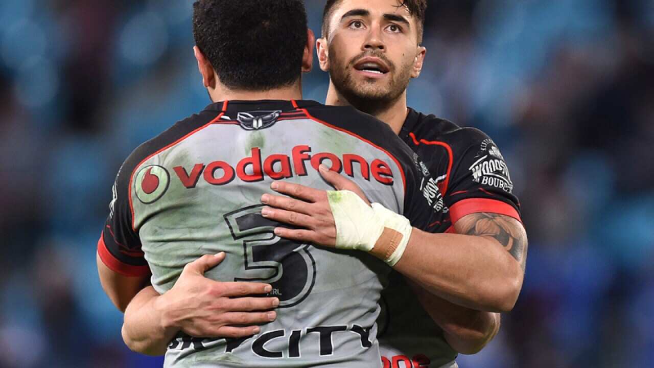 Warriors player Shaun Johnson (right) and Konrad Hurrell