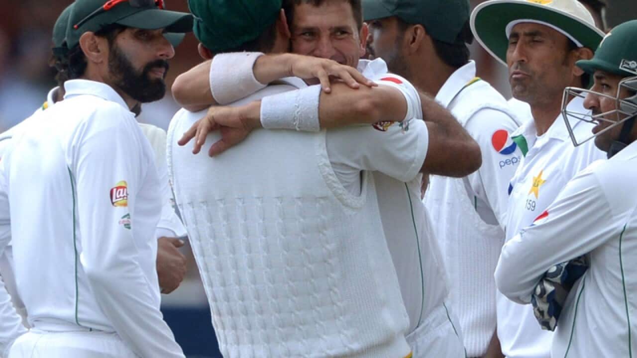 Pakistan players celebrate after claiming a wicket