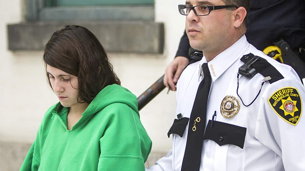 Miranda Barbour is led out of a courthouse