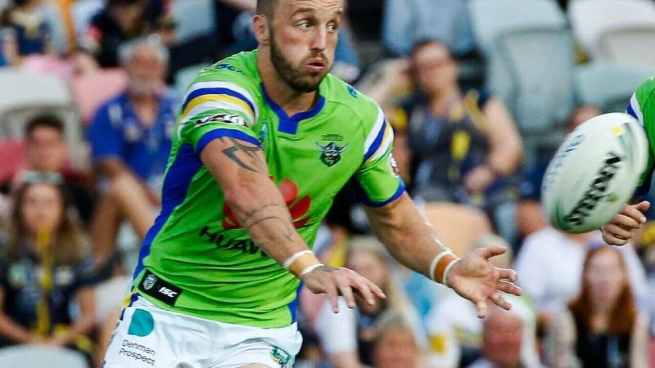 Raiders Josh Hodgson gets a pass away