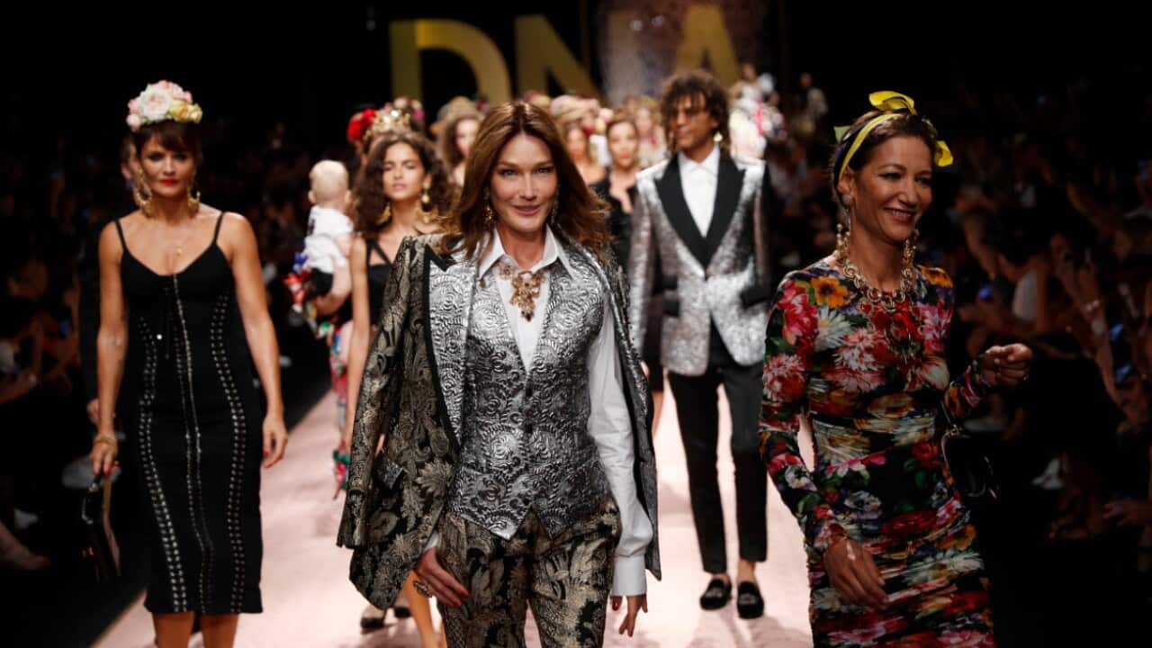 Model Carla Bruni Sarkozy walks with other models for the Dolce & Gabbana women's 2019 Spring-Summer collection