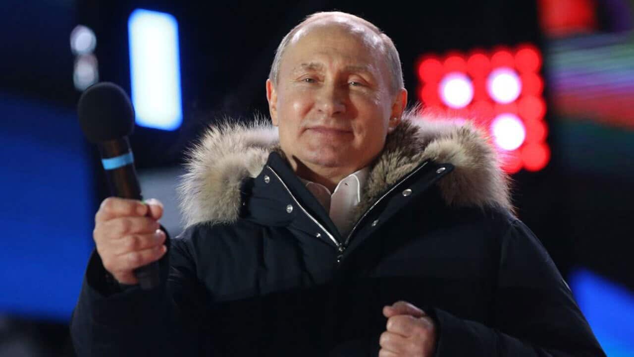 Russian President Vladimir Putin attends a rally of his supporters at Manezhnaya Square near the Moscow's Kremlin, Russia, March 18, 2018. 