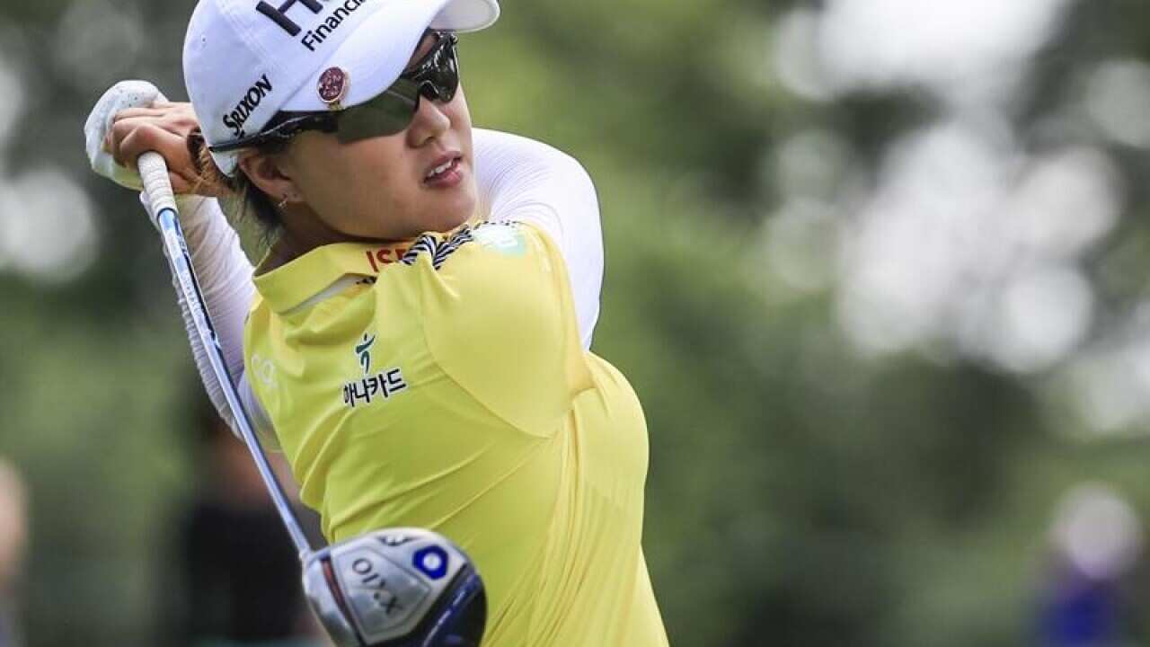 Minjee Lee of Australia hits her tee shot.