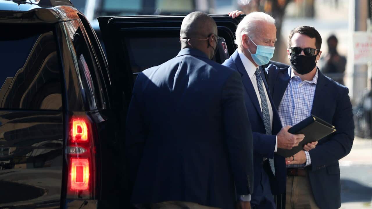  President-elect Joe Biden arrives at the The Queen theater to receive a briefing from the transition COVID-19 advisory board on 9 November, 2020.