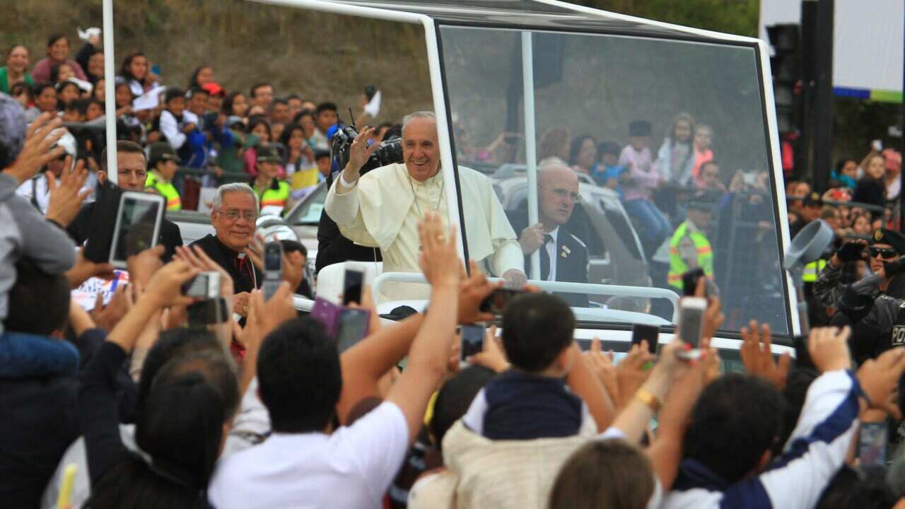 Pope Francis greets the crowd from the popemobile upon his arrival in Quito, Ecuador, 05 July 2015. Pope Francis is visiting Latina America from 05 to 12 July 2015 and he will stop in Ecuador, Bolivia and Paraguay.