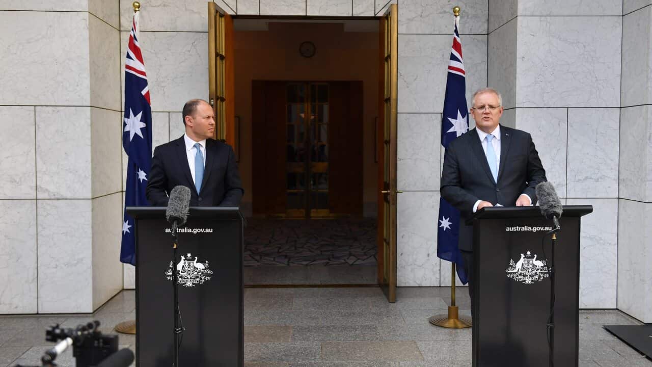 Treasurer Josh Frydenberg and Prime Minister Scott Morrison announce the government's $130b wage subsidy package at a press conference at Parliament House in Canberra, Monday, March 30, 2020. (AAP Image/Mick Tsikas) NO ARCHIVING