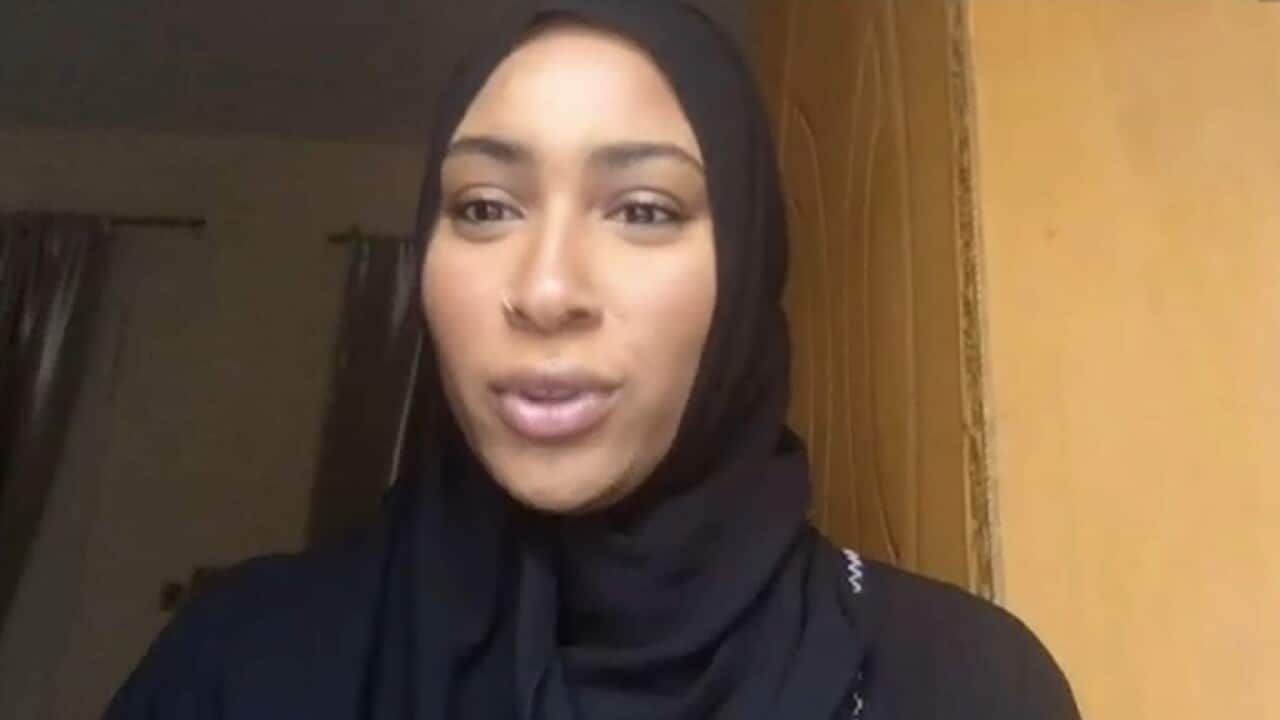 Hameeda Mohamed wears a black headscarf during the video call.