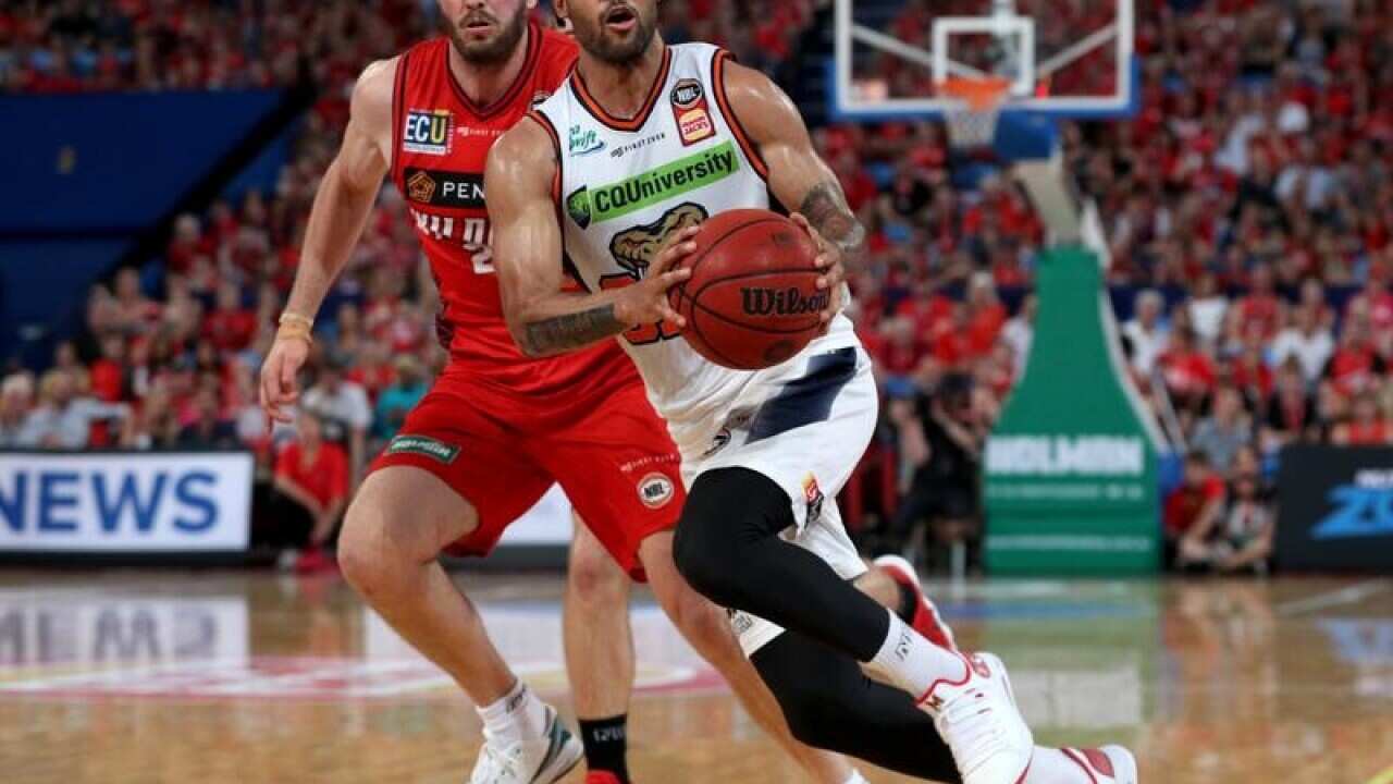 Melo Trimble (right) of the Taipans.