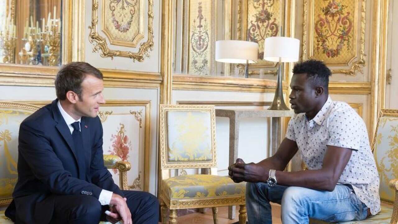 French President Emmanuel Macron receives Mamoudou Gassama