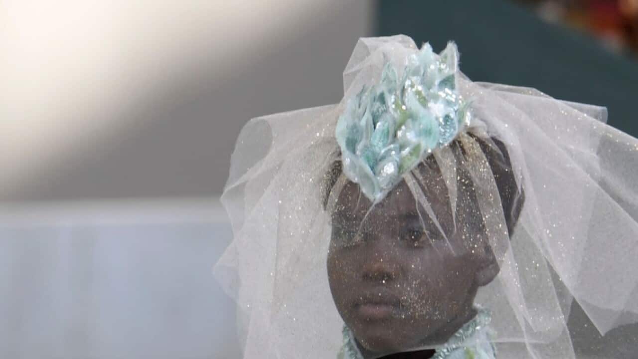 South Sudanese-Australian model Adut Akech presents a creation by Chanel during the 2018-2019 Fall/Winter Haute Couture collection