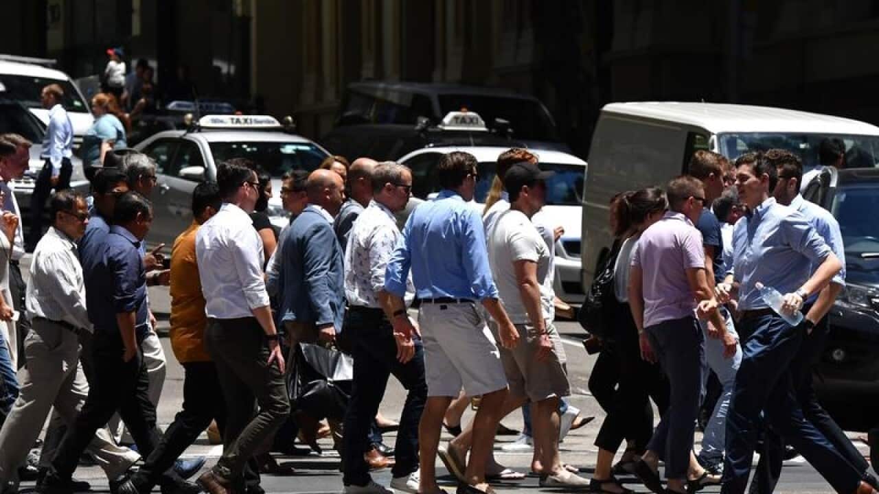 A file image of office workers seen in the Sydney CBD