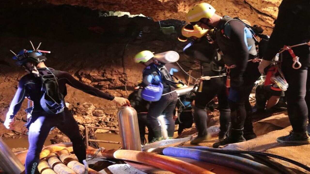 Members of the Thai rescue team inside the cave