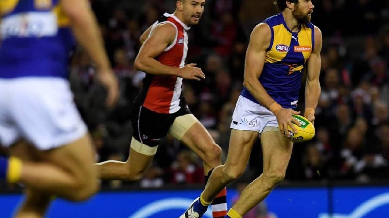 Josh Kennedy of the Eagles kicks for goal goal.