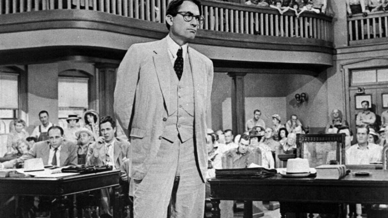 Gregory Peck is shown in a scene from the film "To Kill a Mockingbird"