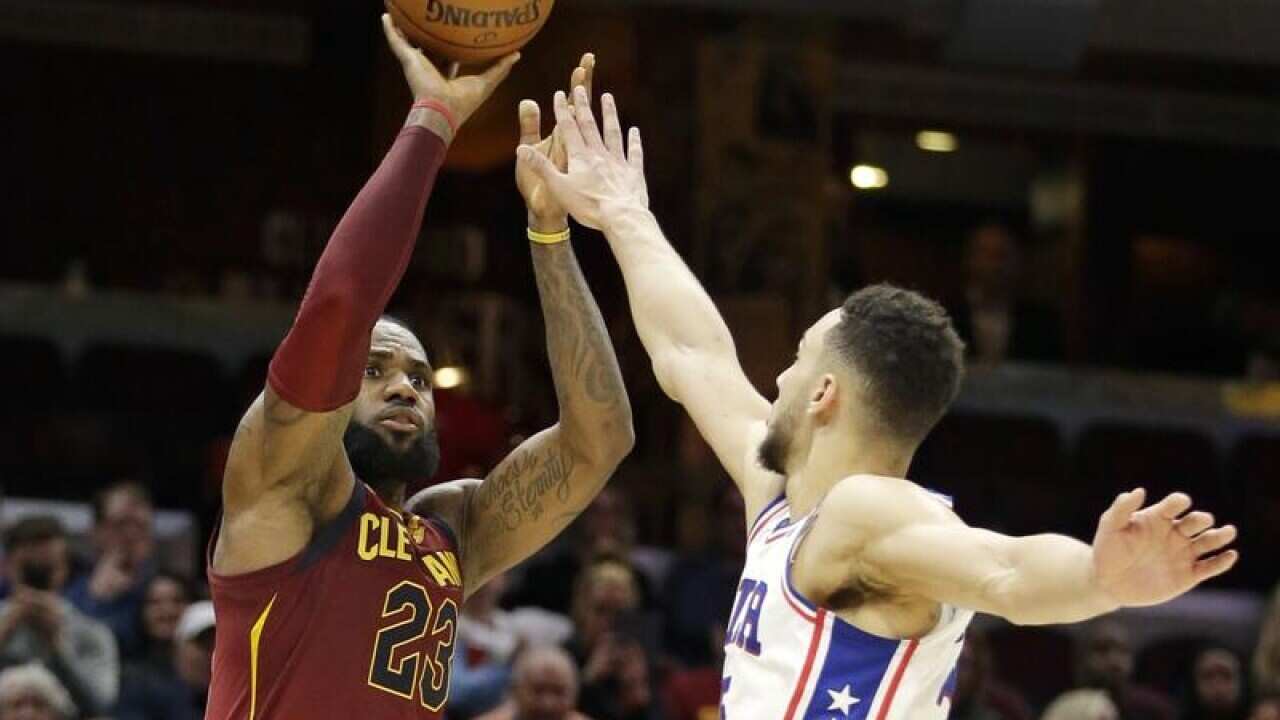 Cleveland Cavaliers' LeBron James and Philadelphia 76ers' Ben Simmons