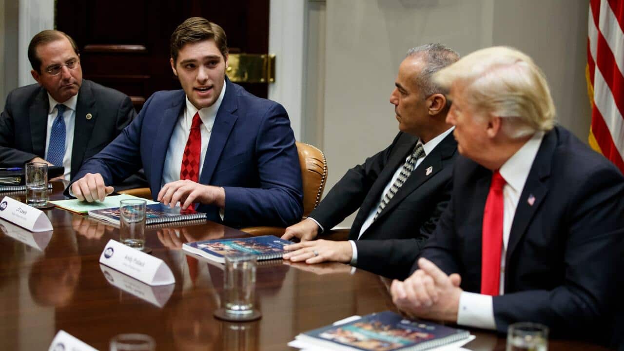 J.T. Lewis, second from left.